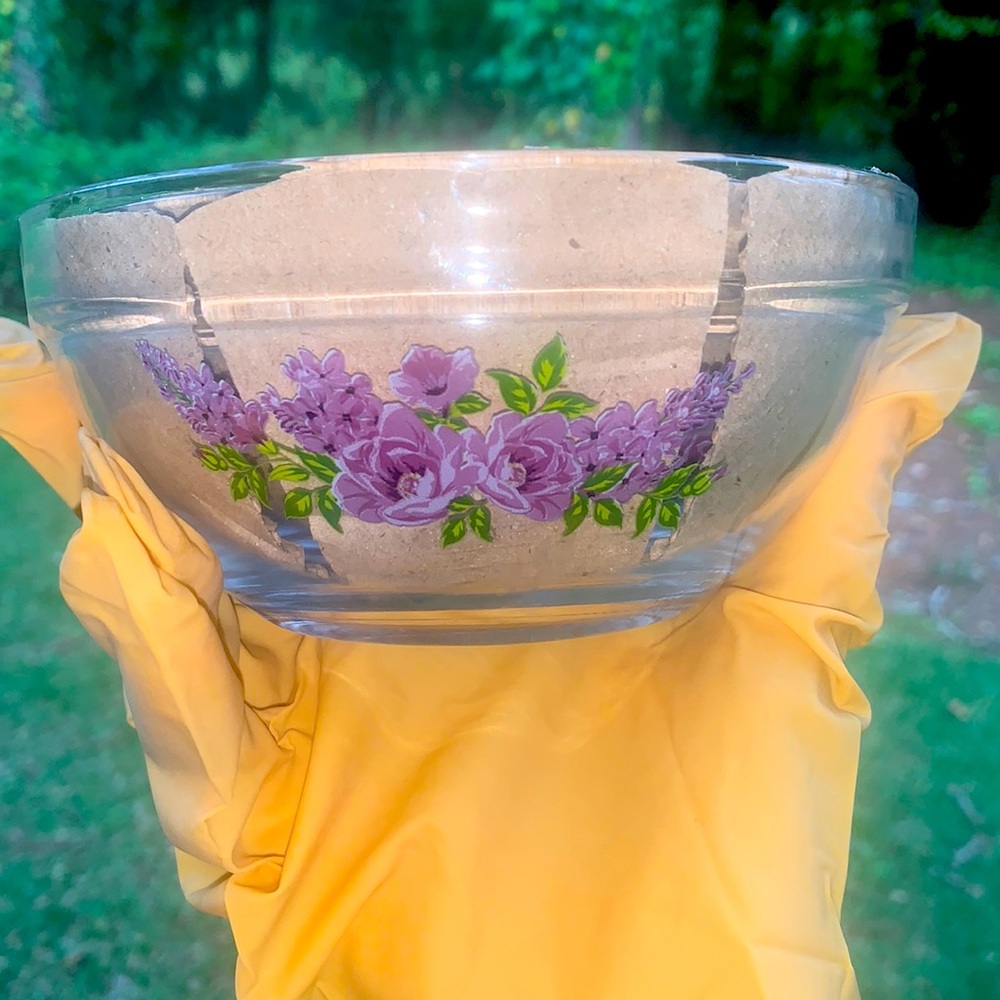 Purple glass bowls 4 sizes big to small.